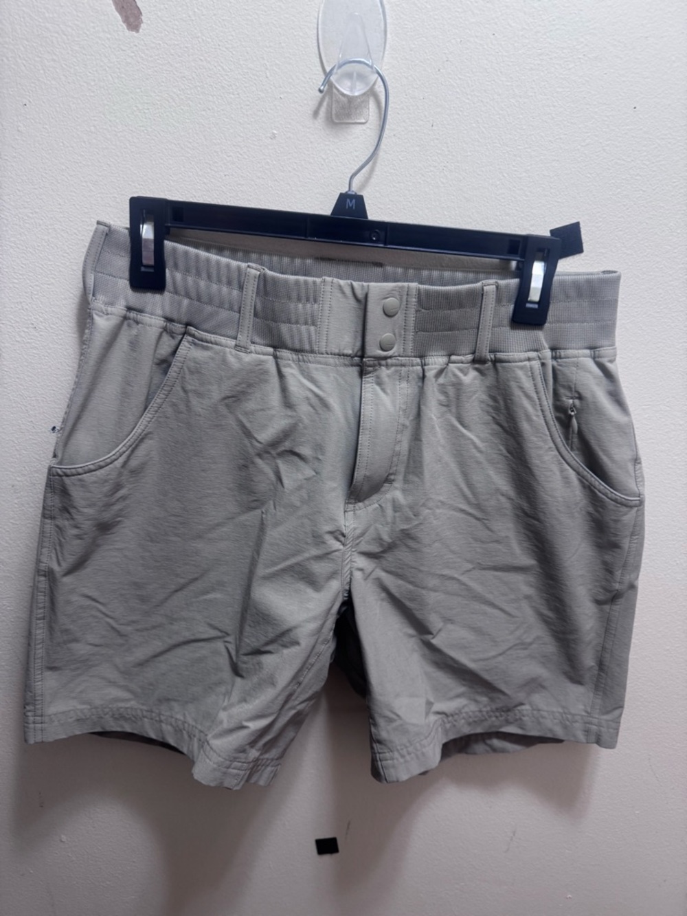 Simms Fishing brand Men's Athletic Shorts in tan size medium
